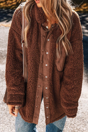 Brown teddy textured utility jacket with button front and pocket details