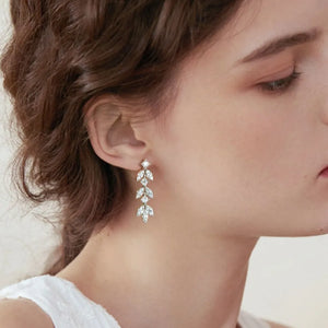 Silver cubic zirconia botanical drop earrings with leaf design
