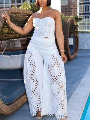 White lace cutout tube top and wide-leg pants set with airy eyelet details.