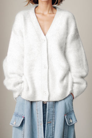White fluffy angora V-neck button cardigan with balloon sleeves.