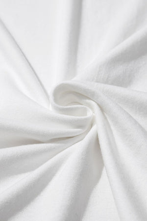 White cotton t-shirt with subtle texture and draped fabric detail.