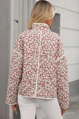 Daisy quilted jacket in burgundy with stand collar and cream trim.