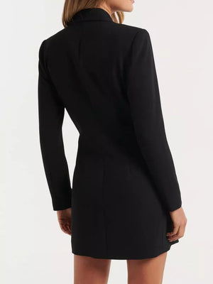 Black tailored double-breasted blazer dress with buttoned front and long sleeves.