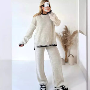 Beige relaxed fit sweater set with contrast trim on neckline, cuffs, and hem.
