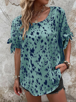 Sky blue blouse with dalmatian print and bow sleeves