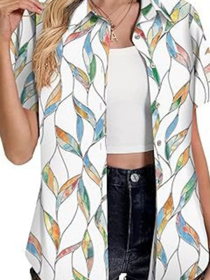 White button-up shirt with colorful leaf print and short sleeves.