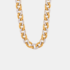 Gold curb chain necklace with zircon insets and adjustable length