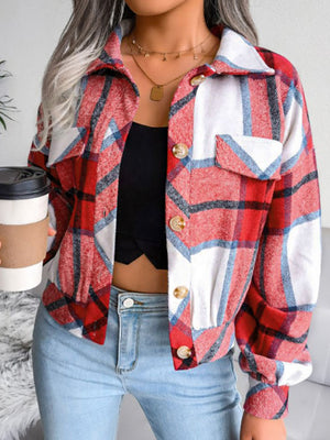 Boxy red plaid shacket with gathered hem, button front, collarless, and chest pockets.