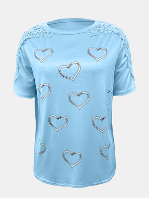 Sky blue t-shirt with heart print and lace trim on shoulders and sleeves.
