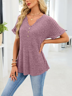 Ribbed knit short sleeve t-shirt in dusty blue with V-neck and decorative buttons, curved hem.