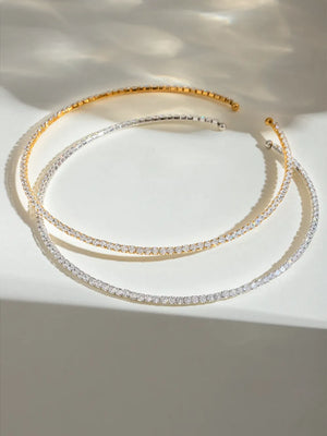 Diamond row collar necklaces in gold and silver, featuring a delicate line of sparkling stones.