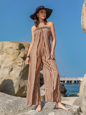 Boho bandeau jumpsuit in brown with a floral paisley print and wide legs.