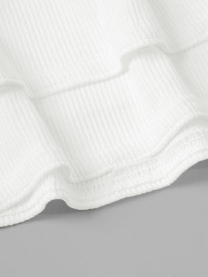 White ribbed tiered mini skirt detail with ruffled hem