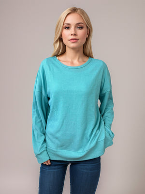 Relaxed fit crewneck waffle knit top in Pastel Blue with long sleeves and a relaxed cut.