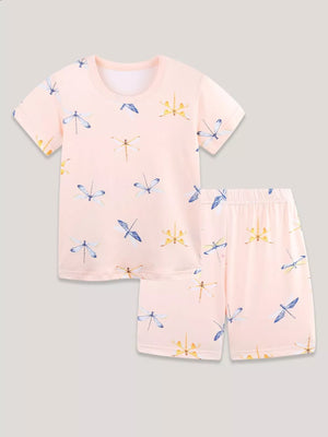 Toddler pajama set with short sleeves and shorts in pink with a dragonfly print.