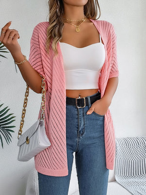 Pink open-knit slouchy cardigan with short sleeves and a relaxed fit.