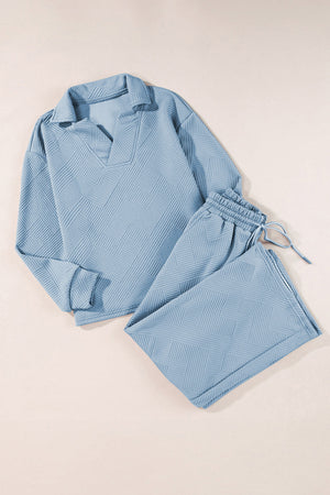 Light blue textured polo shirt and wide-leg culottes set with drawstring waist