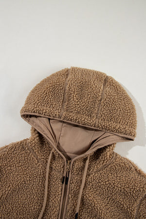 Brown sherpa hooded jacket with contrast lining and drawstring hood.