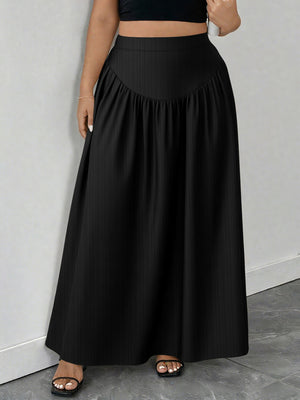 Black maxi skirt with a-line cut and gathered waist detail.