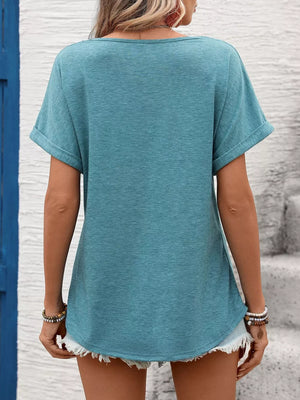 Blue-green relaxed fit t-shirt with cuffed sleeves and lace trim detail.