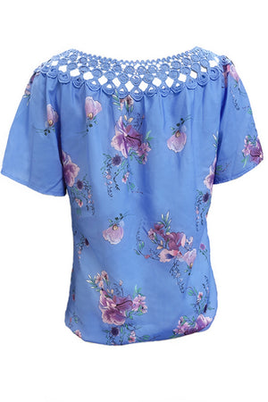 Blue floral blouse with crochet yoke and short sleeves