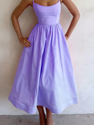 Midi dress in Blue Purple with adjustable straps and a-line skirt.