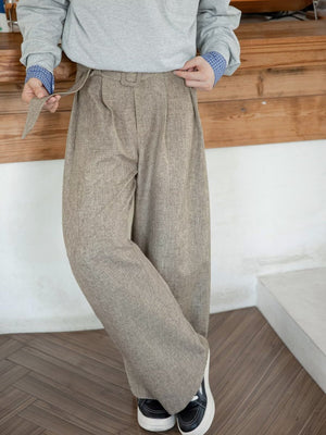 Men's beige wide leg trousers with belt and pockets, casual drawstring style