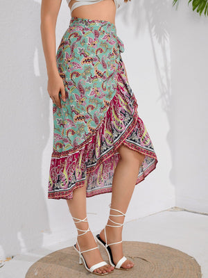 Multicolor paisley wrap midi skirt with ruffled hem and tie waist.