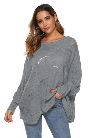 Light gray acrylic knit sweater with openwork detail and boat neck.
