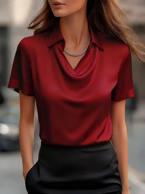 Wine red satin cowl neck maternity shirt with short sleeves.