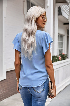 Pastel blue ruffle sleeve tie-front blouse with V-neck