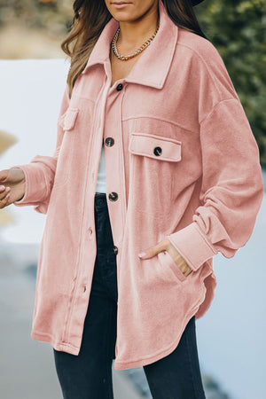 Fleece shirt jacket in Blush Pink with patch pockets and button front.