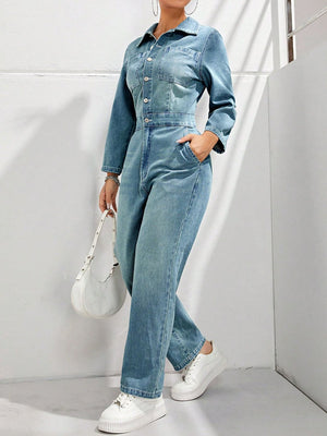 Structured light denim boiler suit with button front and collar, full length sleeves and legs.