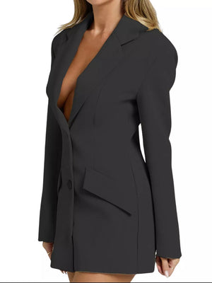 Black tailored lapel blazer dress with button and pocket detail.