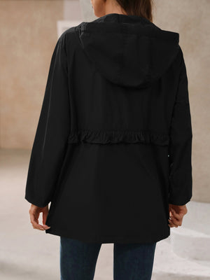 Black hooded windbreaker jacket with ruffled waistline detail