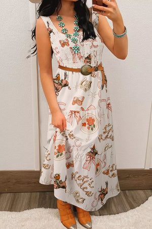 Cowboy U-neck midi dress in white with a playful cowboy and horseshoe print, tiered skirt, and smocked bodice.