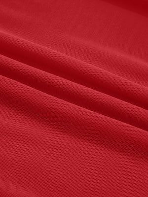 Deep red sheer mesh fabric with a honeycomb pattern, showing texture and drape.