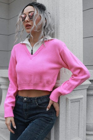 Pink cropped v-neck sweater with zip detail and white collar
