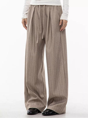 Khaki wide-leg pleated trousers with pinstripes and drawstring waist