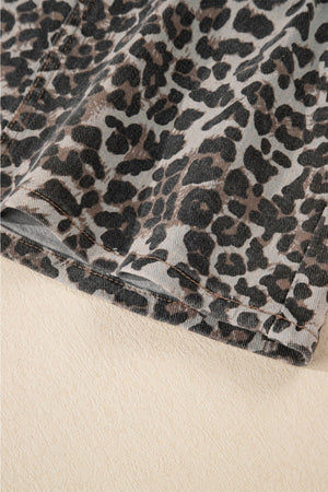 Leopard print denim mini skirt with visible stitching detail
