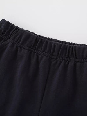 Black cotton toddler pants with elastic waistband detail