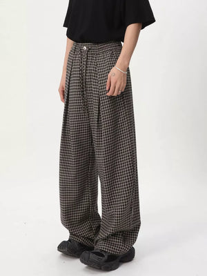 Plaid wide-leg joggers with adjustable drawstring waist and relaxed fit.
