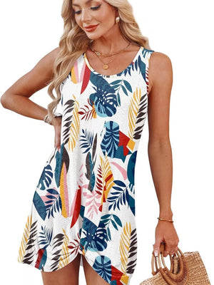 Eyelet tank dress with multicolor tropical leaf print and twisted hem detail.