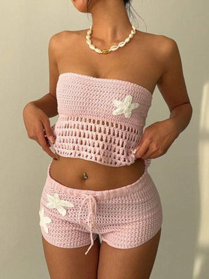 Pink crochet tube top and shorts set with flower appliques and drawstring shorts.