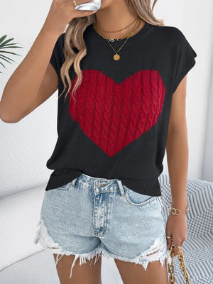 Black cable knit sweater vest with a red cable knit heart graphic.