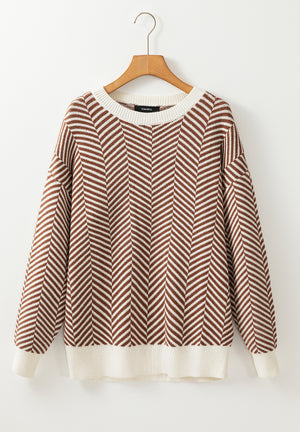 Chevron knit crewneck sweater in camel and white with cream ribbed cuffs and hem.