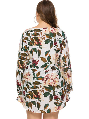 Botanical print trapeze mini dress in ivory with long sleeves and a scoop neckline.
