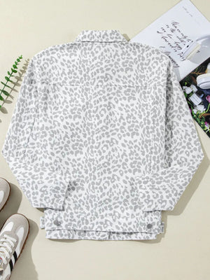 White stone washed leopard print denim jacket with button front and collar.