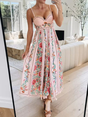 Pink sweetheart neck maxi dress with floral print and vertical stripes
