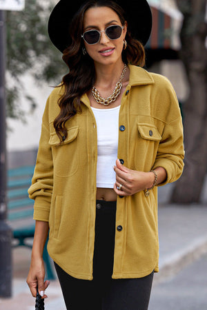 Fleece shirt jacket in Chartreuse with patch pockets and button front.